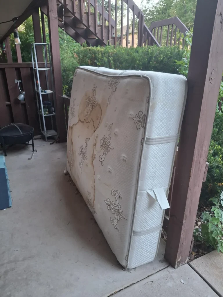 Old mattress ready for removal in Colorado Springs
