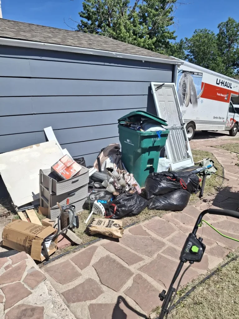 Junk and household items before property cleanout in Colorado Springs