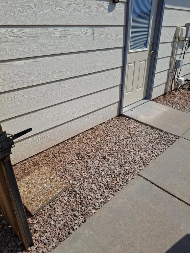 Cleared area after property cleanout and junk removal in Colorado Springs