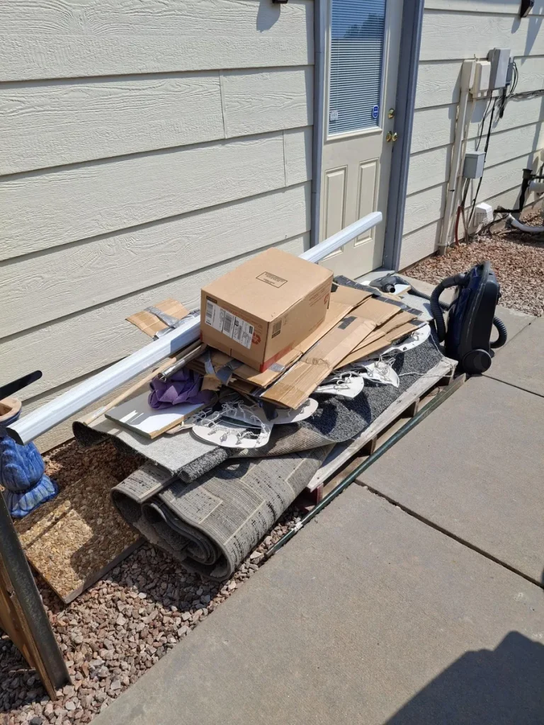 Household junk staged for property cleanout in Colorado Springs